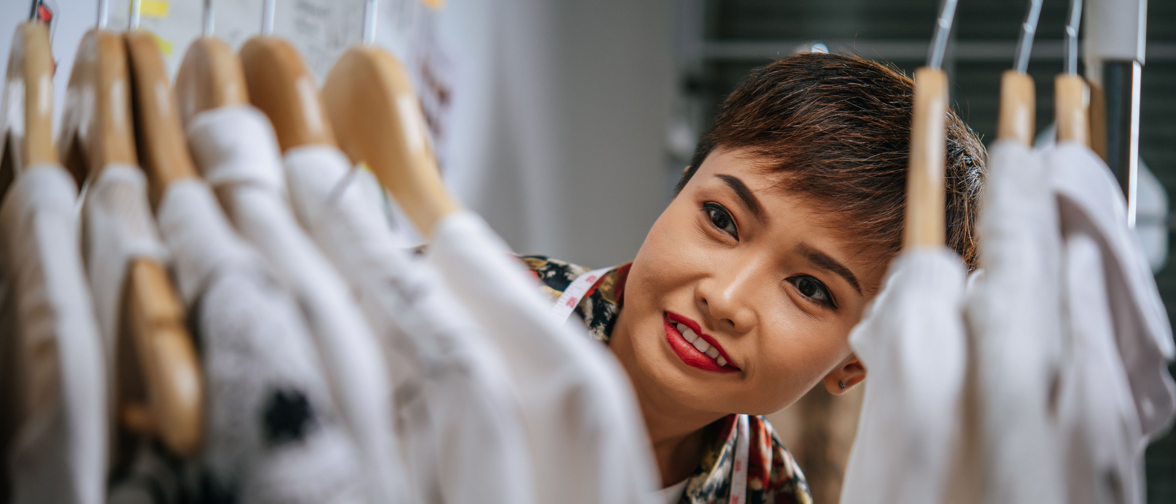 smiley designer proud with her clothes 